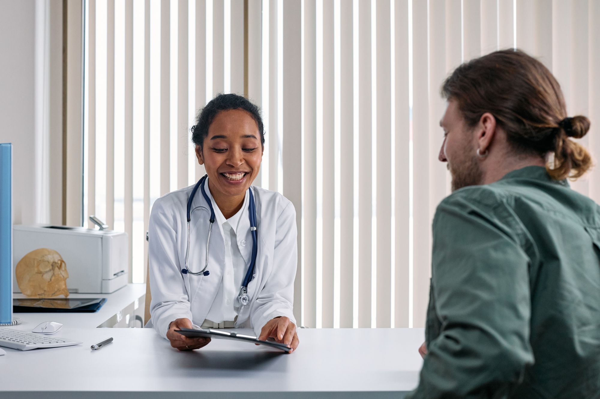 Calm consultation between clinician and patient, representative of Clinova’s clinical environment in Dubai.