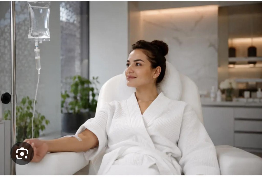 Patient in a treatment chair during a skin-care visit, used to represent Clinova’s skin-whitening care in Dubai — not a named patient.